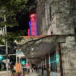 the neon sign for agora