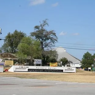 a white bus parked in a parking lot