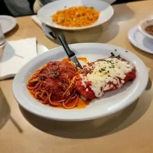 a plate of spaghetti and meat