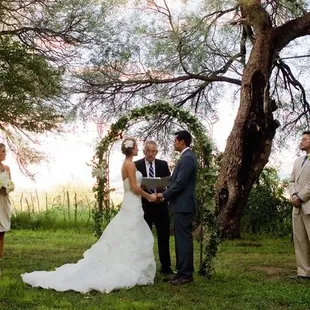 a bride and groom during their wedding ceremony