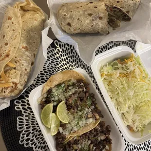 California Burrito, Carneasada Burrito (cut), Cabeza tacos and 3 rolled tacos!