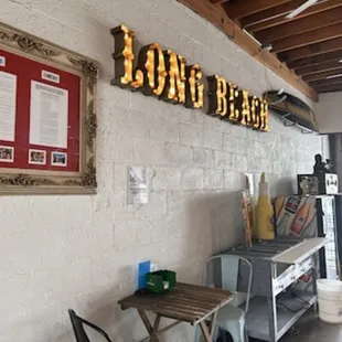 a long beach sign on the wall