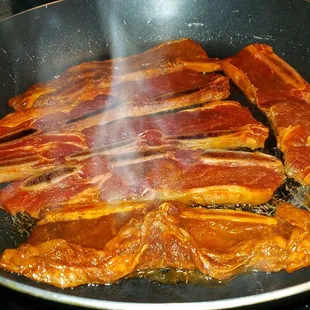Marinated ribs.  $5.99/lbs