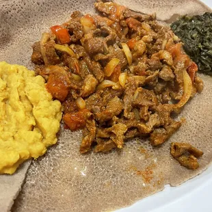 Lamb Tibs with split peas and collard green sides
