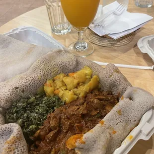 5. Lamb Tibs with Mango Juice Greens and cabbage