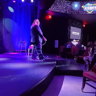 a man standing on a stage