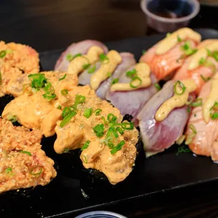 Spicy ahi &amp; spicy hamachi (on the left).  Aburi ahi &amp; aburi salmon (on the right)