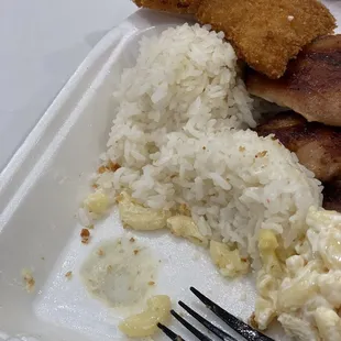 The burnt plastic box for the #4 Seafood Mix Lunch $11.29. The fried seafood was on top of that spot