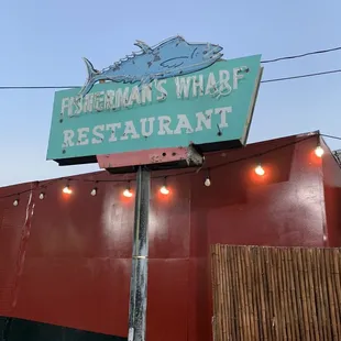 a sign for fisherman&apos;s wharf restaurant