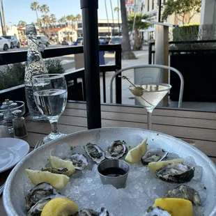 Dirty martini and happy hour oysters