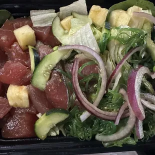 Onolicious Poke!!  Always freshly made daily, it's just good food..  my normal is large to go salad base, 3 Soy Ahi, and 5 toppings.