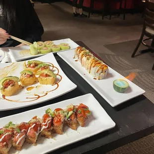 three plates of sushi