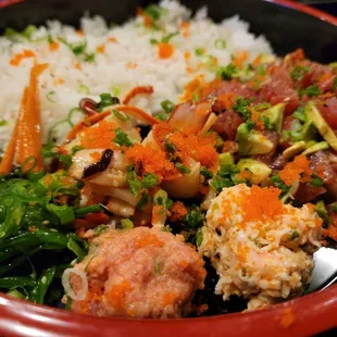 Poke bowl.  This has a calamari salad, seafood salad, crab salad along with the poke and rice.  It's a very generous portion and delicious!