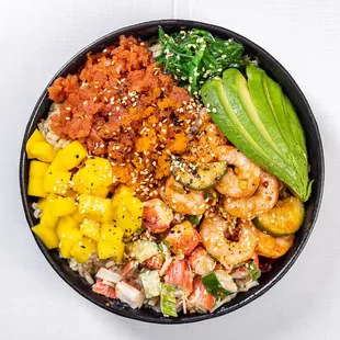 a bowl of food on a white surface