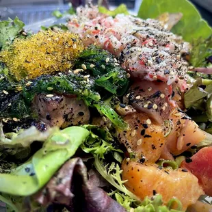 a close up of a salad in a bowl