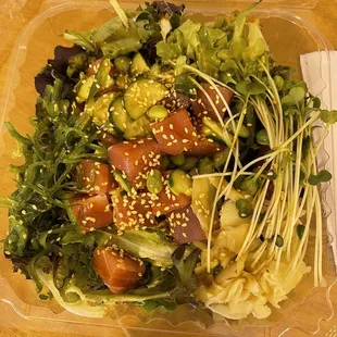 a salad in a plastic container
