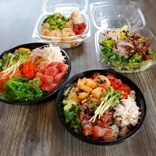 three bowls of food on a table