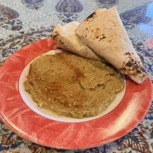 Baba goo nooj served with 1 flour tortilla