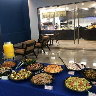 a variety of food displayed on a table