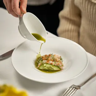 Hamachi Crudo
sliced yellowtail, cucumber, chickpea, dill