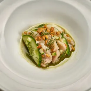 Hamachi Crudo
sliced yellowtail, cucumber, chickpea, dill