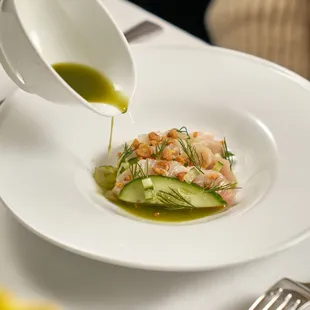 Hamachi Crudo
sliced yellowtail, cucumber, chickpea, dill