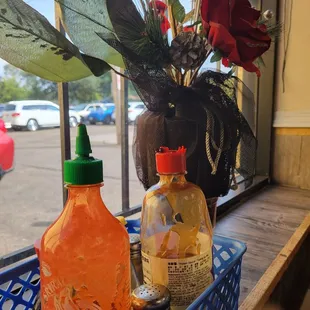 two bottles of hot sauce