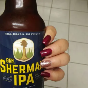 Posing my new nails with my favorite beer in my hand lol. No acrylic! Did an amazing job and definitely will come back.