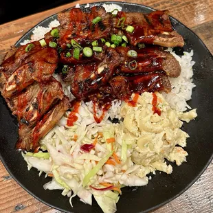 Short rib plate - beef rib Mac salad, slaw, rice.