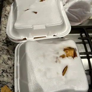 a meal in a styrofoam container