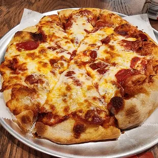 The Pizza. Not Detroit style but not NYC either. Will ask to be made extra crispy/well done next visit.