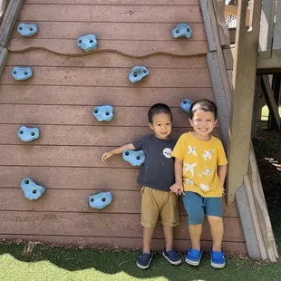 Welcome to Aikahi Elementary School Park! Alika and Tai by the rock climbing wall