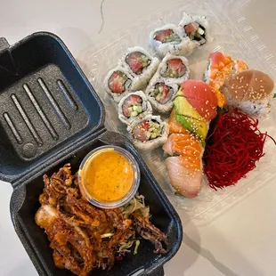 squid legs, yellowtail sushi, rainbow roll