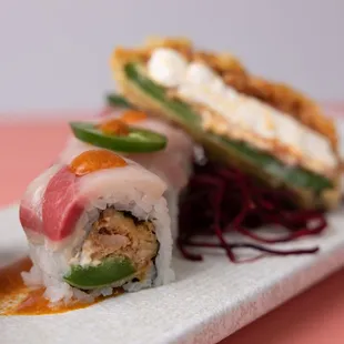 a close up of a plate of sushi