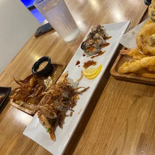 Crispy Squid, shrimp &amp; vegetable tempura, rattlesnake roll, salmon crunch roll