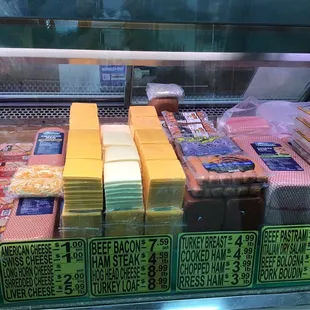 a display of cheese and meat