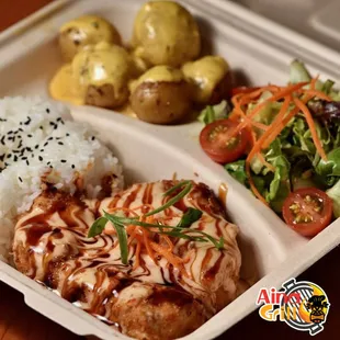 a meal in a styrofoam container