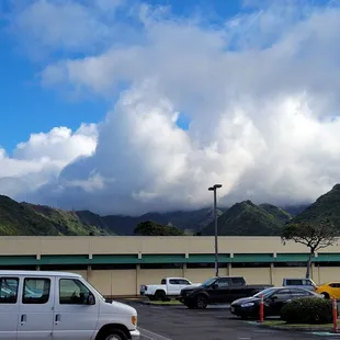 The majestic mountains rising behind the center.