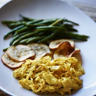 Aji de Gallina (Peruvian Shredded Chicken with Yellow Pepper Sauce) served with Sweet Potato Chips and Long Beans