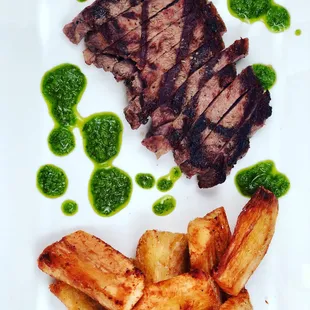 Grilled Sirloin with Chimichurri Sauce served with Yuca Fries