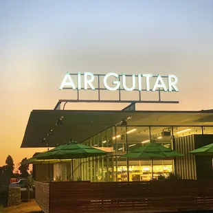 Air Guitar from the street. Front Patio.