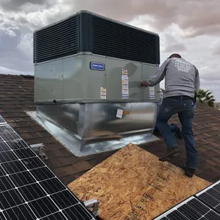 Requested we reposition solar panels to provide adequate space in case of unit service.