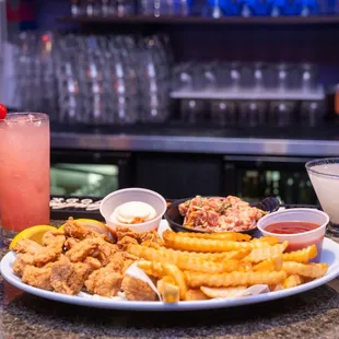 a plate of food and drinks