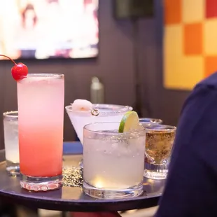 Cocktail waitress delivers drink orders directly to your private karaoke room!