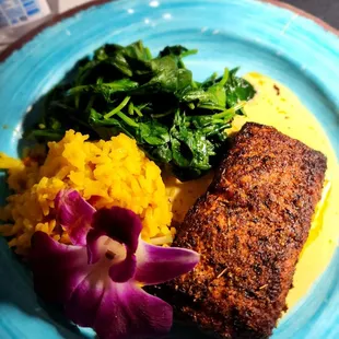 Salmon with yellow rice and sautéed spinach