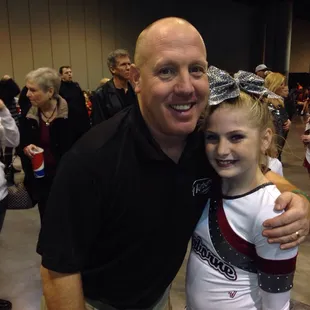 Coach Tim and my daughter last season.