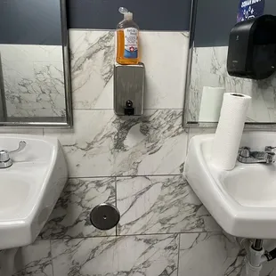 Walls are so dirty! Soap on top of dispenser and paper towel machine is broken