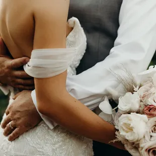 a bride and groom embracing