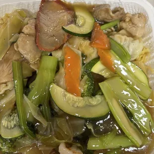 Soft Gau Gee with vegetables over soft noodles