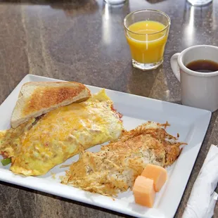 Three Egg Omelet Served with hash browns and toast or biscuit Cheese $5.99 Ham &amp; Cheese $6.99 Western